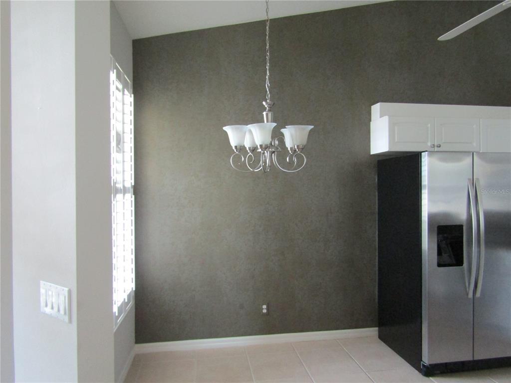 1669 Monarch Drive, Unit 204 Venice, FL 34293 - Photo 6 of 17 a view of water heater room