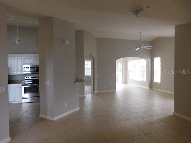1669 Monarch Drive, Unit 204 Venice, FL 34293 - Photo 8 of 17 a view of entryway and kitchen