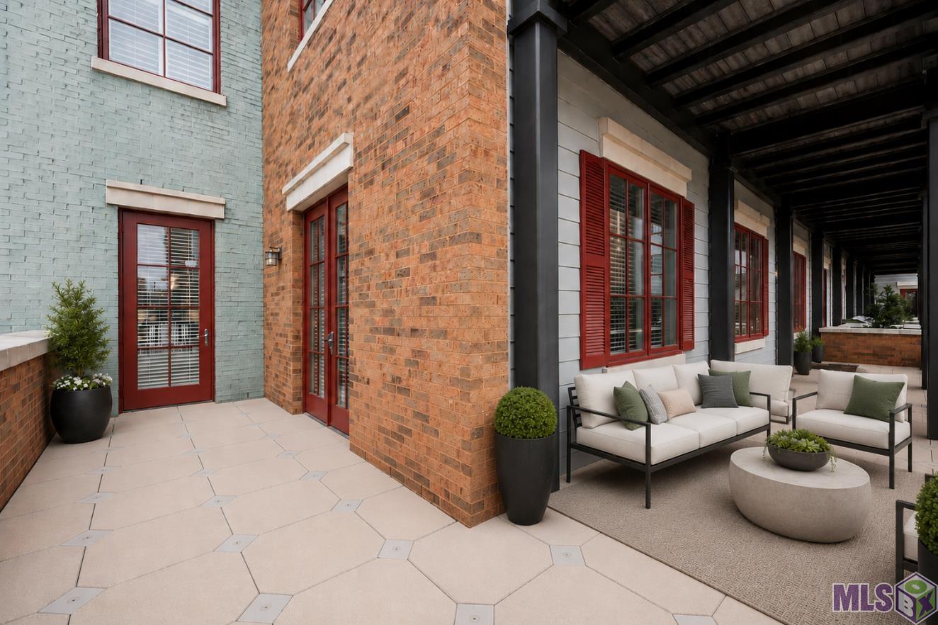 7707 Bluebonnet Boulevard, Unit 229 Baton Rouge, LA 70810 - Photo 17 of 31 Virtually Staged Outdoor Patio Space