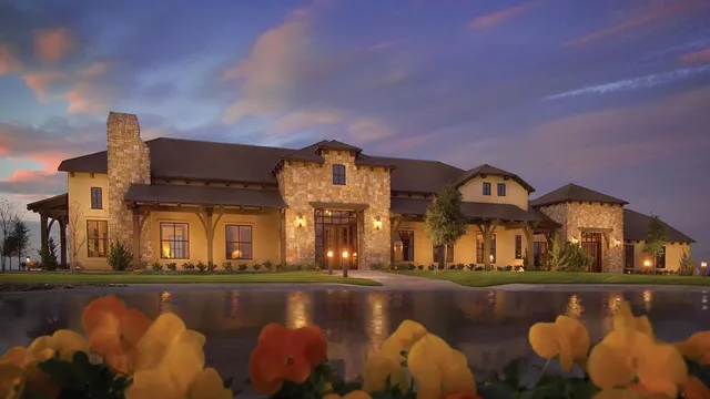 a front view of a house with swimming pool yard and outdoor seating