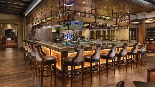 a view of a chairs and table in a patio