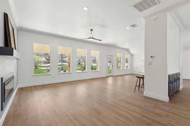a view of livingroom with furniture wooden floor and window