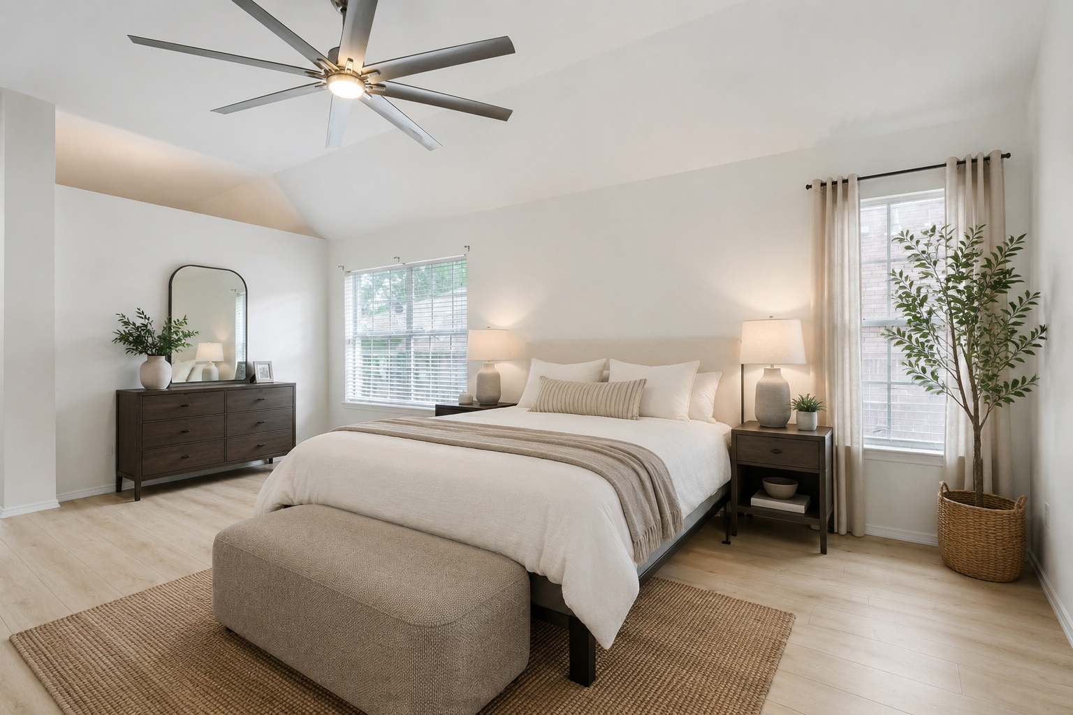 206 Gann Street Georgetown, TX 78626 - Photo 10 of 19 a bedroom with a large bed and a chandelier