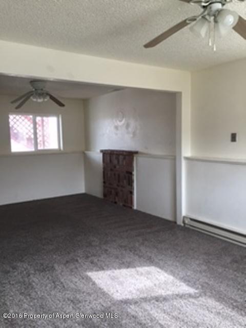 600 Hutton Avenue Rifle, CO 81650 - Photo 3 of 10 an empty room with windows