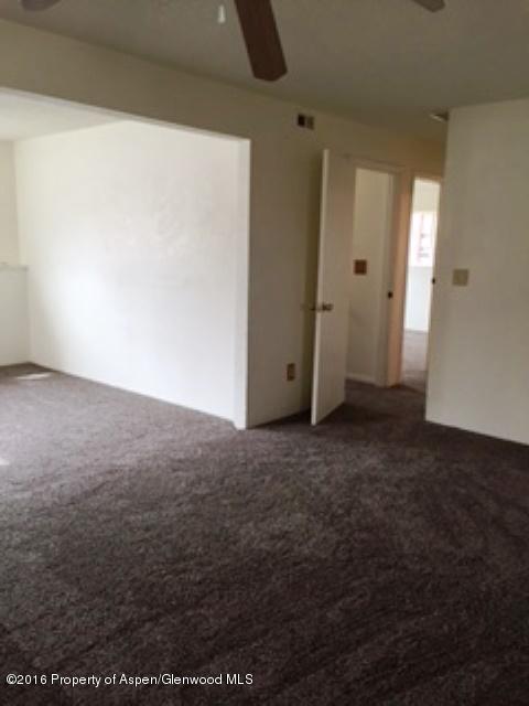 600 Hutton Avenue Rifle, CO 81650 - Photo 4 of 10 an empty room with windows
