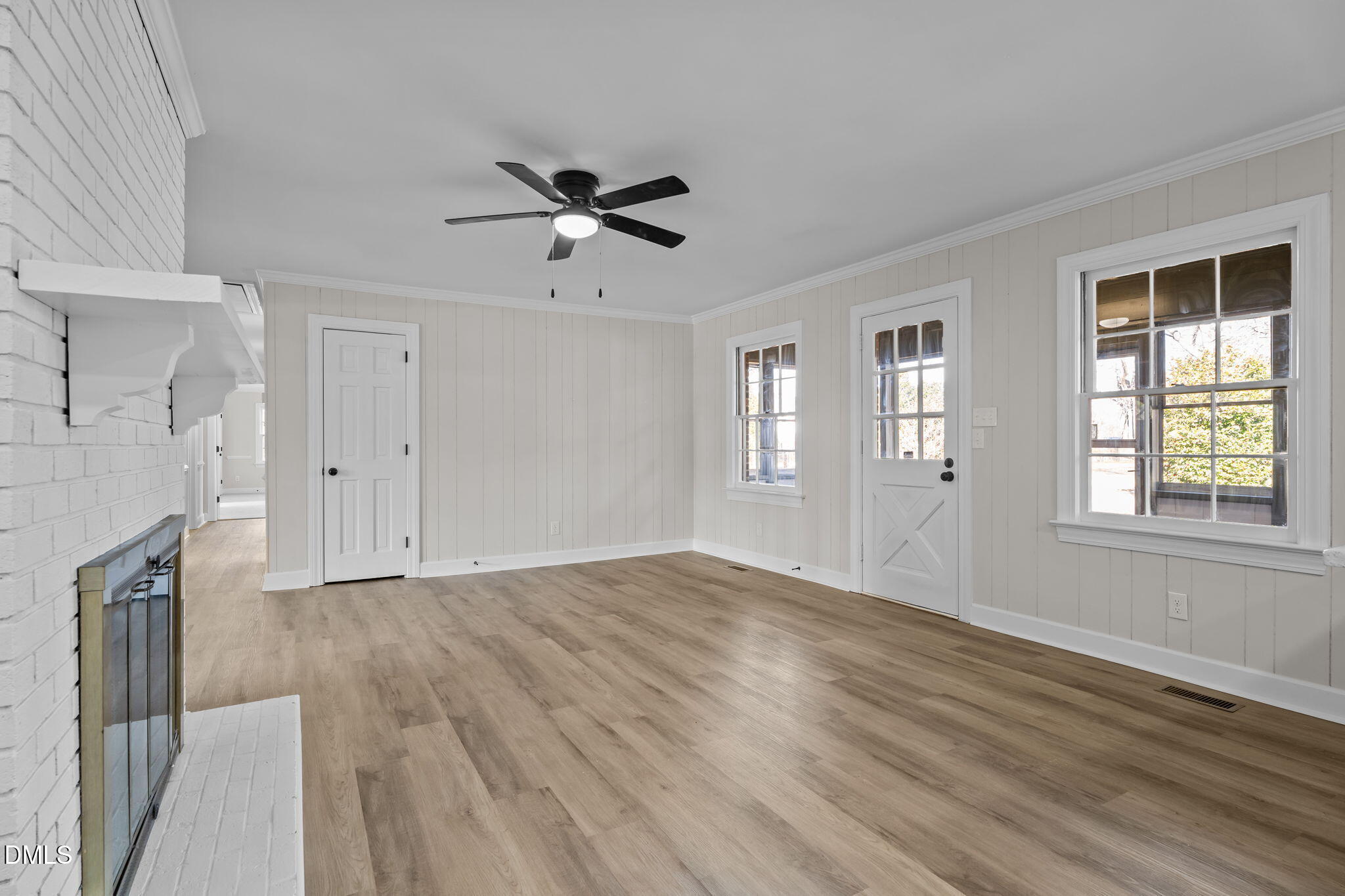 3738 Red Oak Battleboro Road Battleboro, NC 27809 - Photo 11 of 53 a view of empty room with window and wooden floor