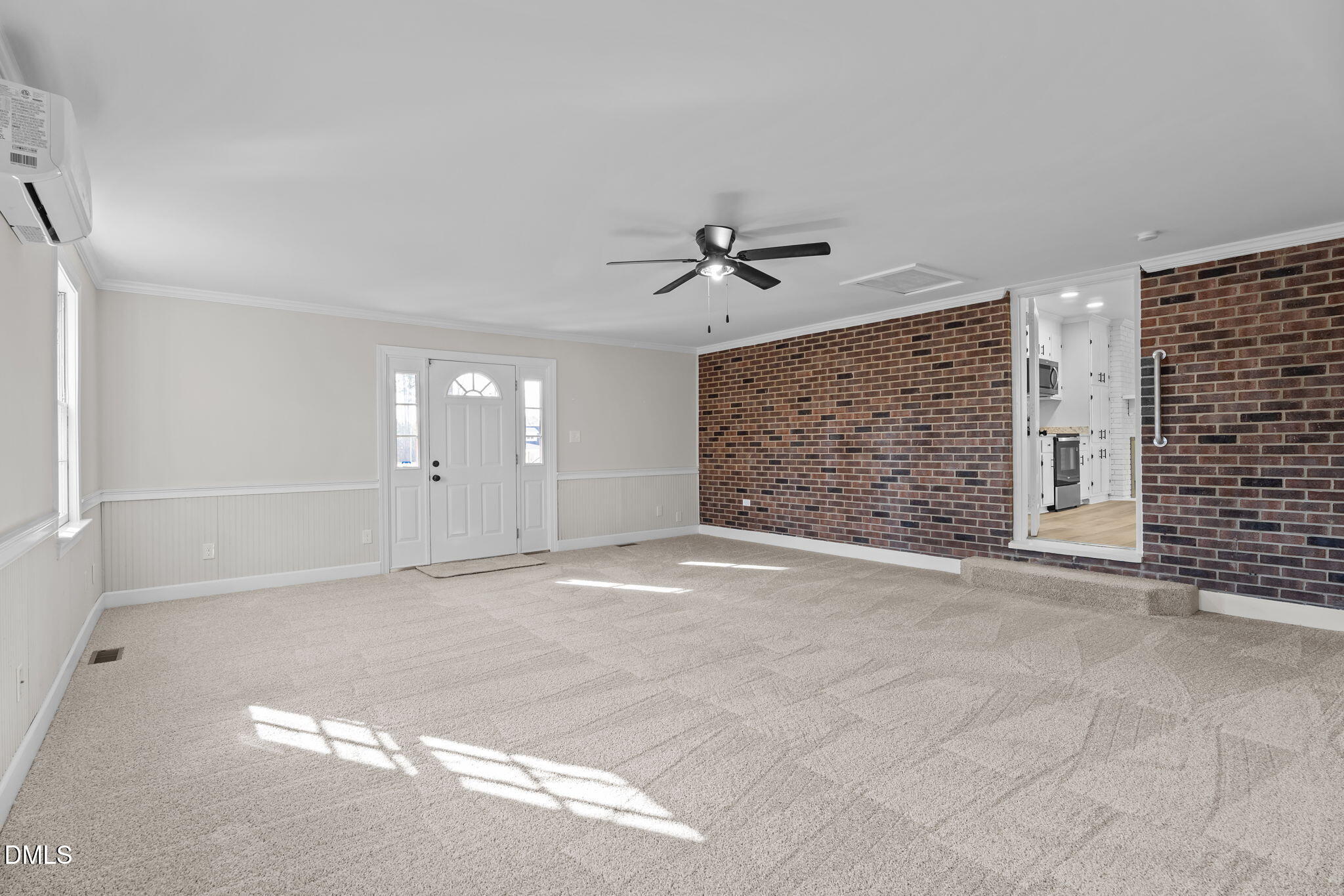 3738 Red Oak Battleboro Road Battleboro, NC 27809 - Photo 16 of 53 a view of an empty room with brick walls