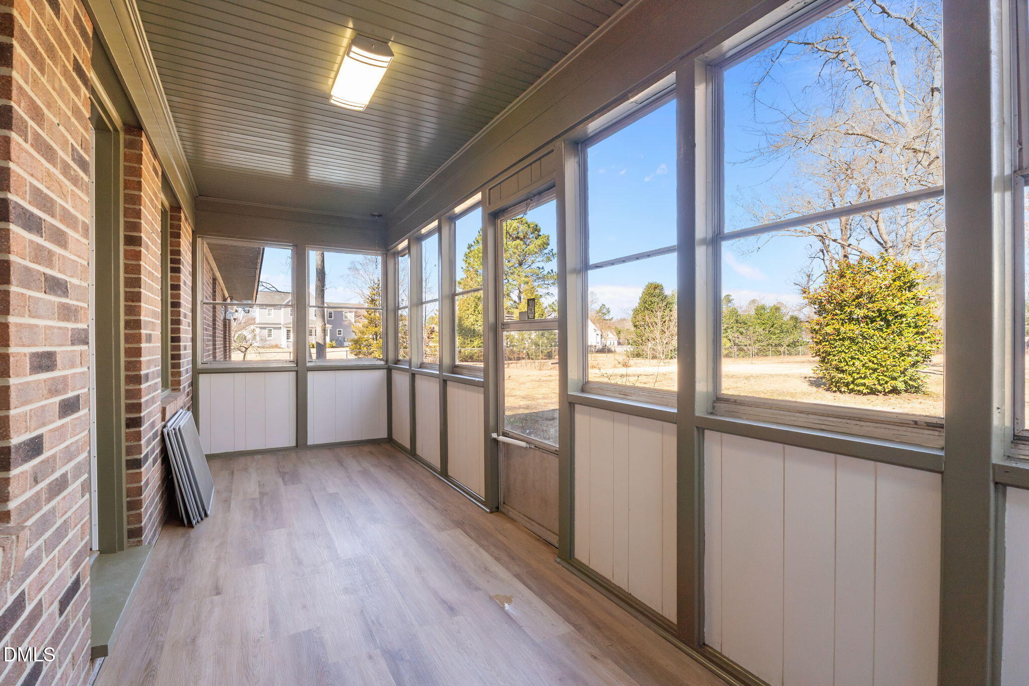 3738 Red Oak Battleboro Road Battleboro, NC 27809 - Photo 17 of 53 wooden floor in an empty room with a window