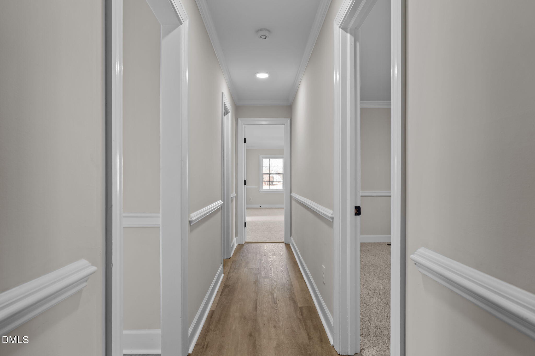 3738 Red Oak Battleboro Road Battleboro, NC 27809 - Photo 24 of 53 a view of a hallway with a wooden floor