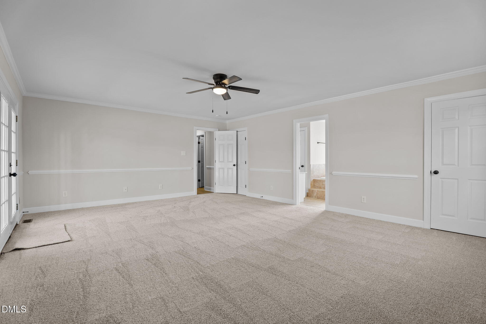 3738 Red Oak Battleboro Road Battleboro, NC 27809 - Photo 28 of 53 a view of an empty room with a ceiling fan