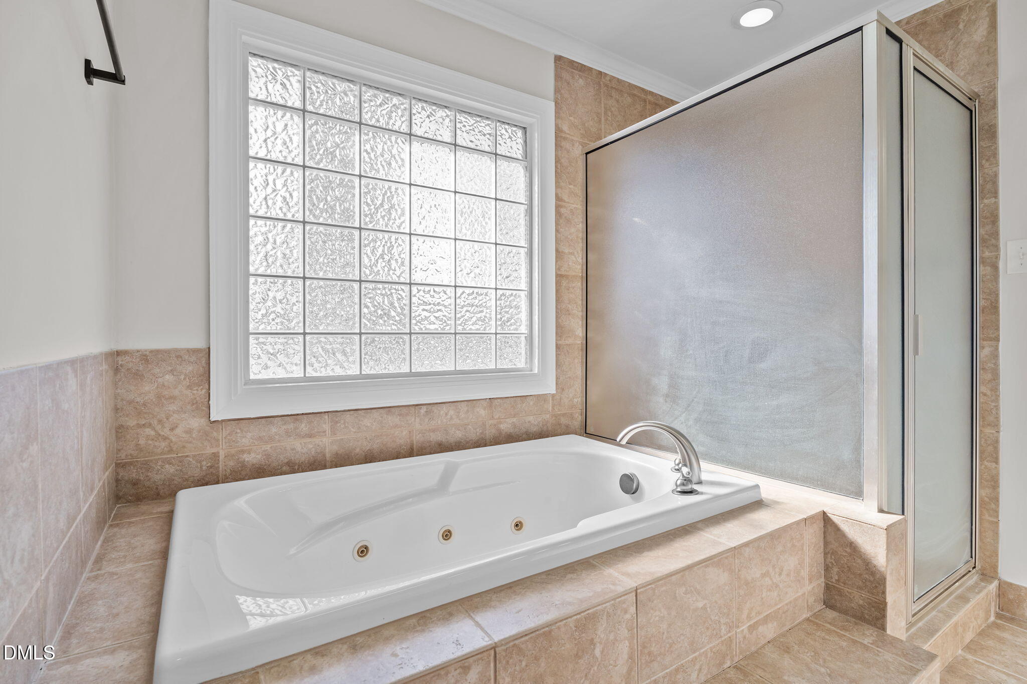 3738 Red Oak Battleboro Road Battleboro, NC 27809 - Photo 31 of 53 a bathroom with a tub and a shower