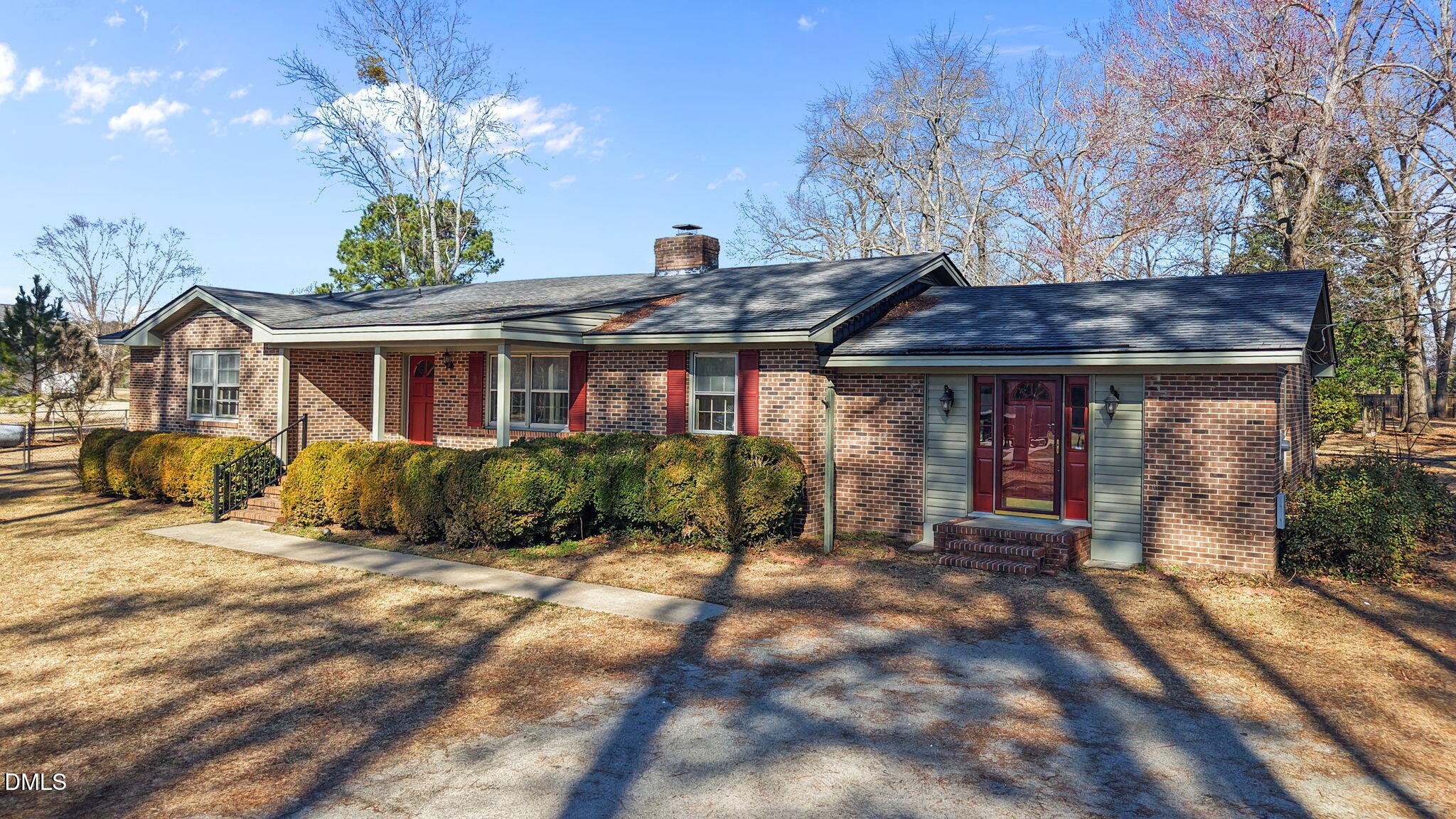 3738 Red Oak Battleboro Road Battleboro, NC 27809 - Photo 34 of 53 a front view of a house with a garden