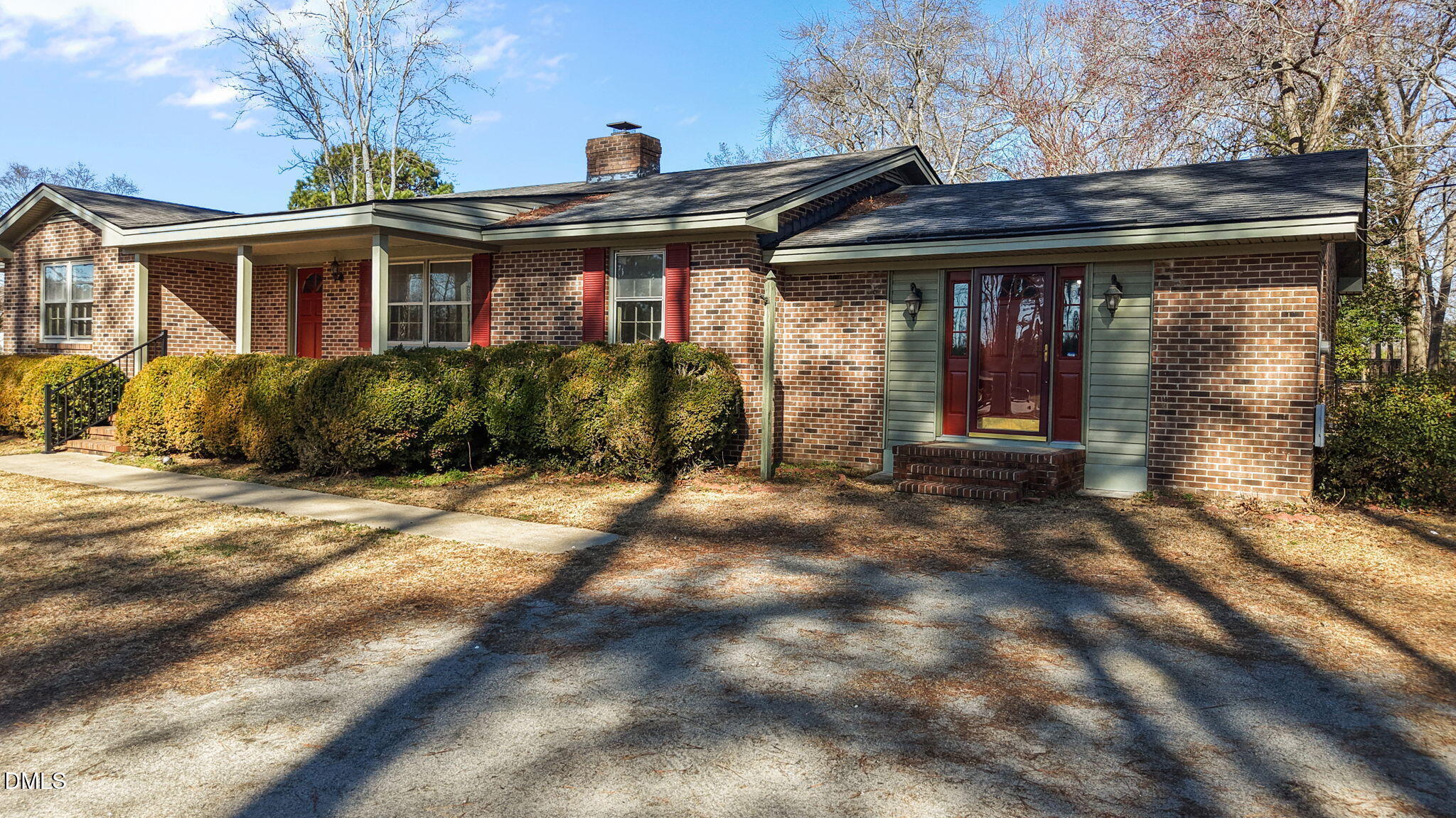 3738 Red Oak Battleboro Road Battleboro, NC 27809 - Photo 37 of 53 a front view of a house with a garden
