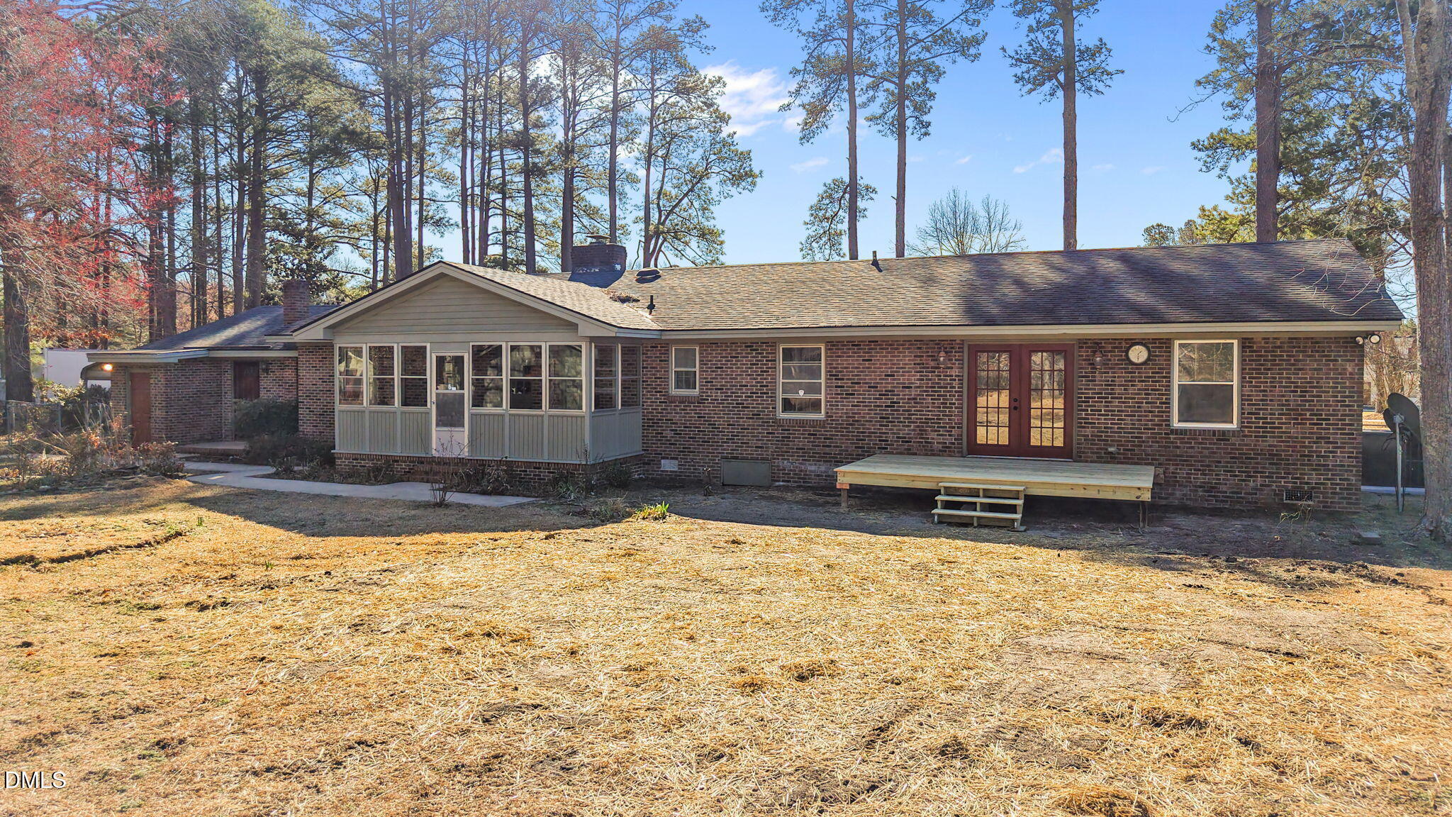 3738 Red Oak Battleboro Road Battleboro, NC 27809 - Photo 42 of 53 a front view of a house with a yard covered with snow