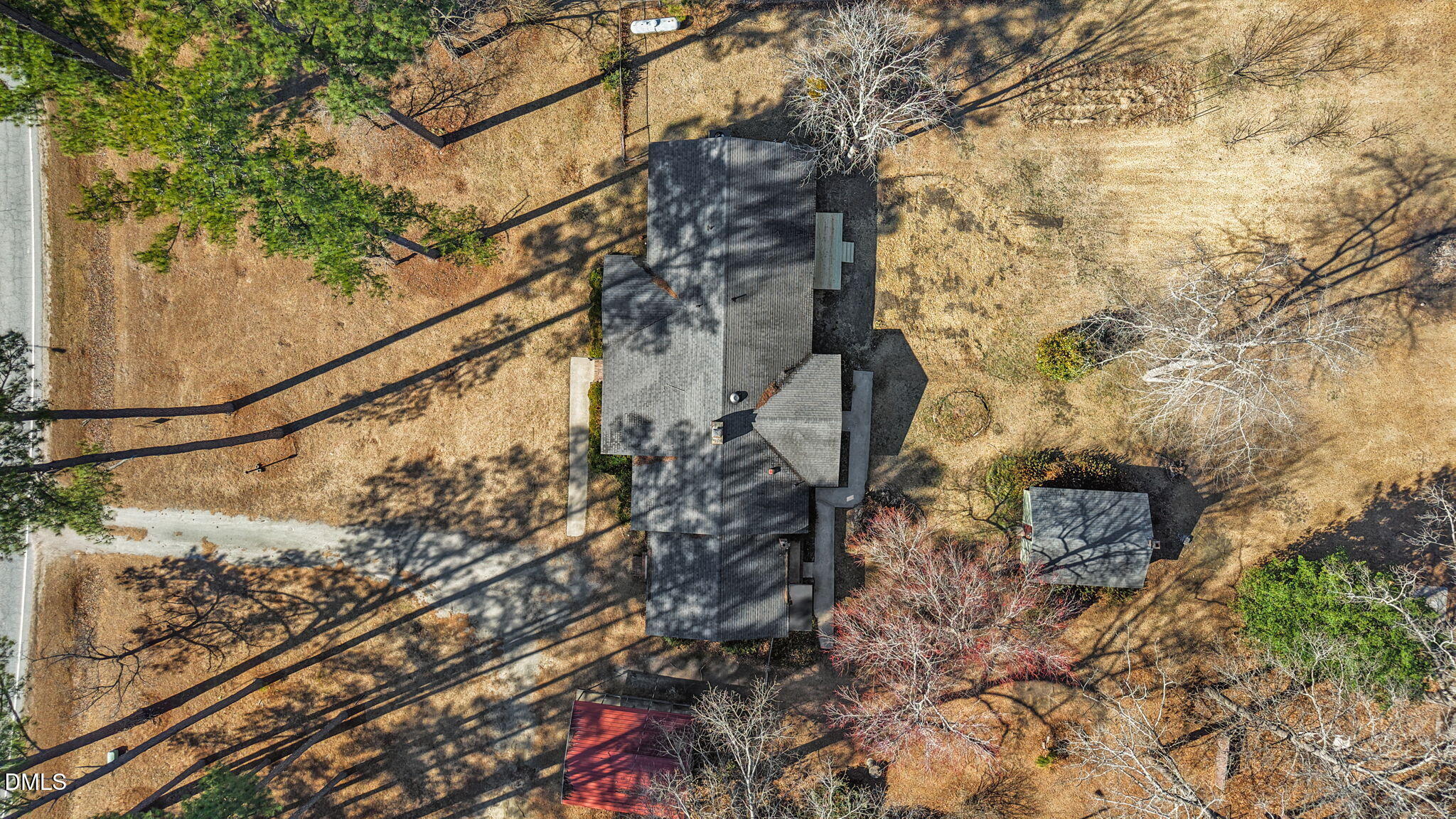 3738 Red Oak Battleboro Road Battleboro, NC 27809 - Photo 51 of 53 a backyard of a house with lots of green space