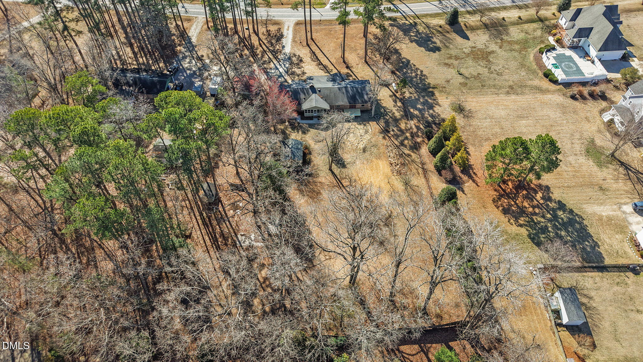 3738 Red Oak Battleboro Road Battleboro, NC 27809 - Photo 53 of 53 a backyard of a house with lots of green space