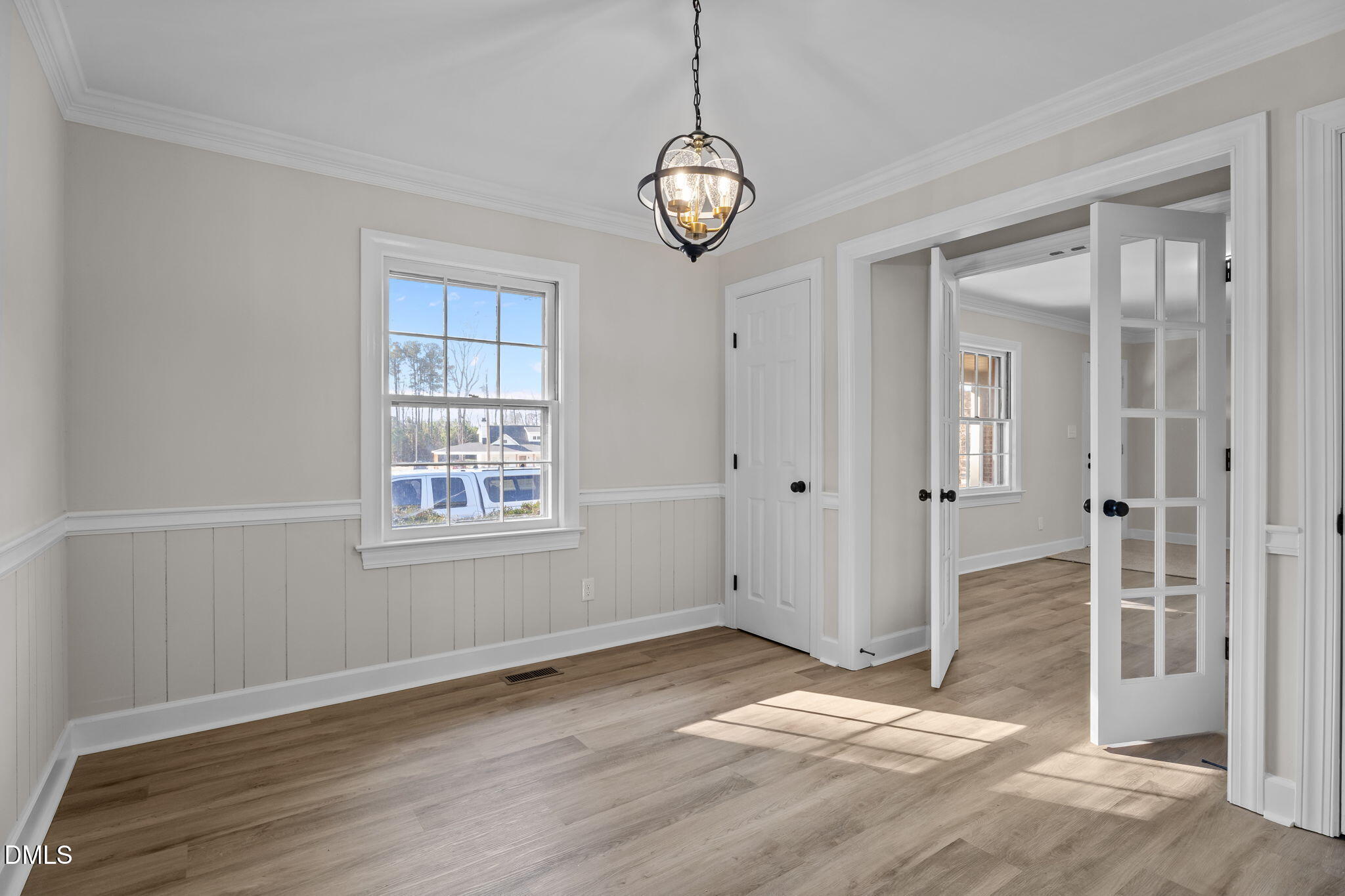 3738 Red Oak Battleboro Road Battleboro, NC 27809 - Photo 8 of 53 a view of an empty room with wooden floor and window