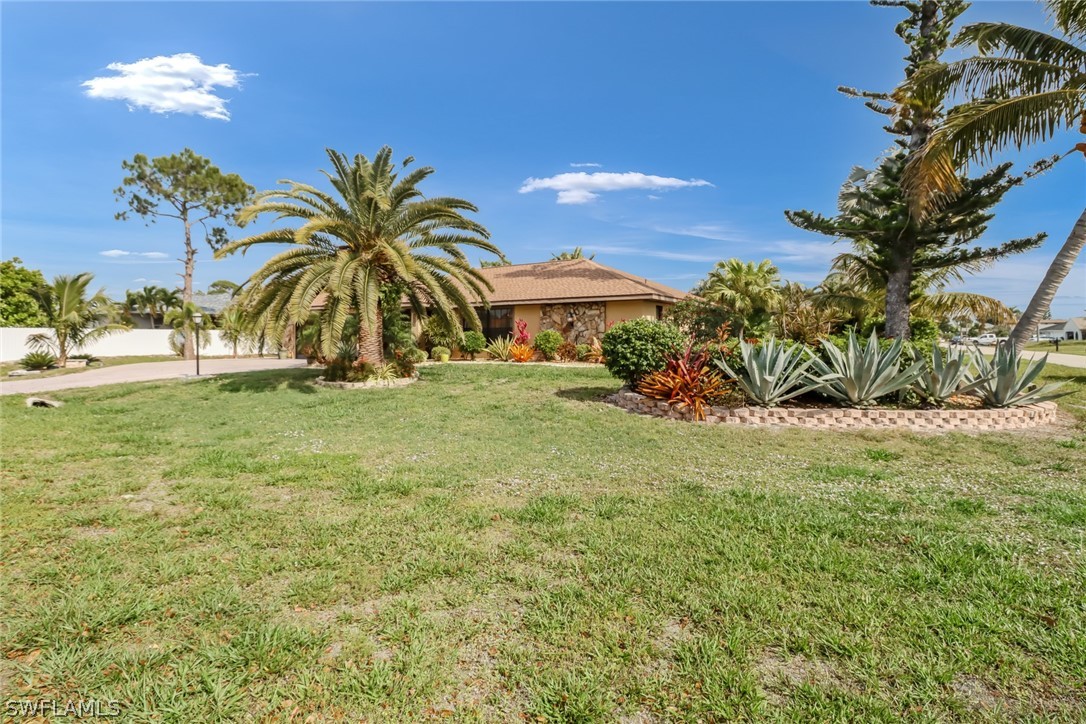 7523 Morgan Road Fort Myers, FL 33967 - Photo 3 of 25 a view of an ocean with palm trees