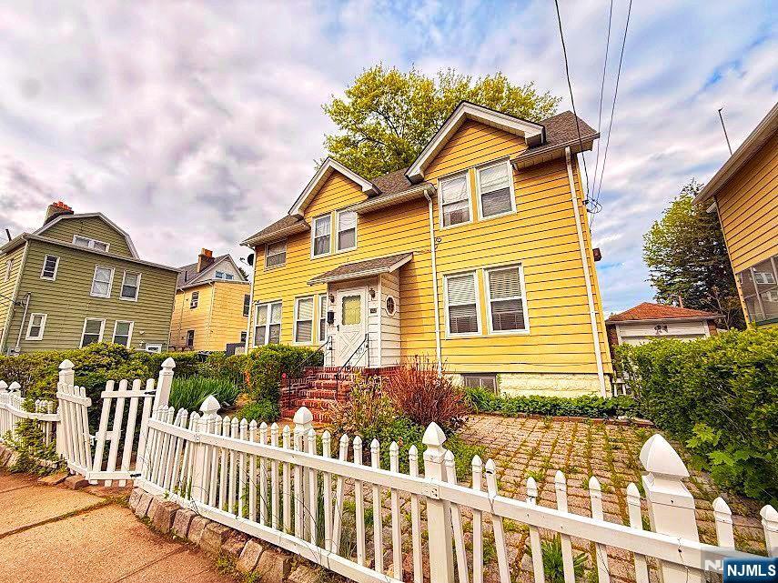 102 State Street Bloomfield, NJ 07003 - Photo 1 of 11 a front view of a house with a garden
