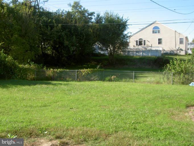 319 Trappe Road Baltimore, MD 21222 - Photo 2 of 8 a view of a house with a yard