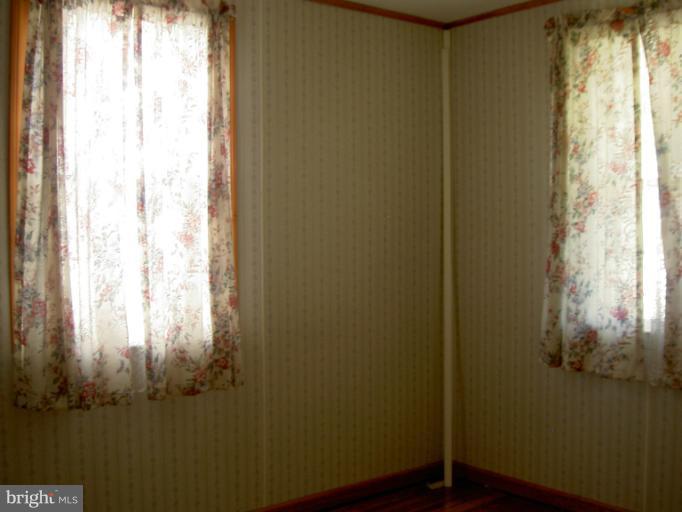 319 Trappe Road Baltimore, MD 21222 - Photo 4 of 8 a bathroom with a window