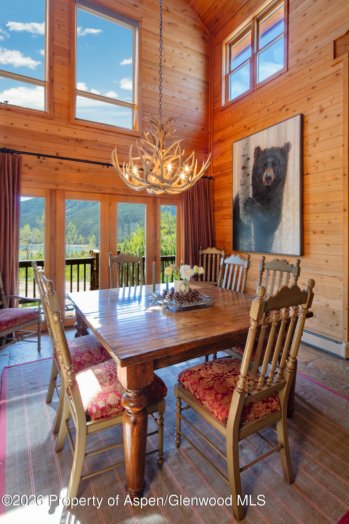 294 Ruedi Creek Road Basalt, CO 81621 - Photo 12 of 27 a view of a table and chairs in the patio