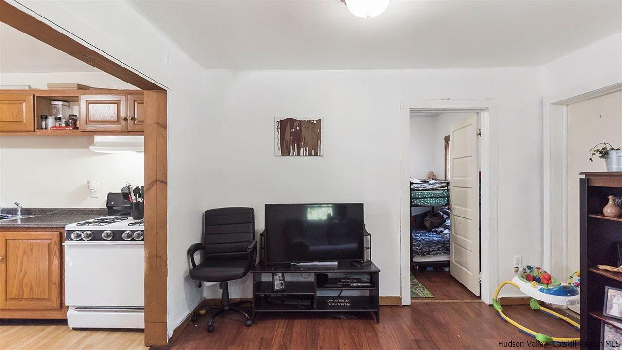 879 Samsonville Road Kerhonkson, NY 12446 - Photo 14 of 16 a living room with furniture and a flat screen tv
