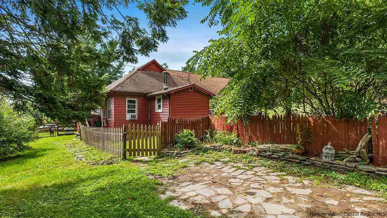 879 Samsonville Road Kerhonkson, NY 12446 - Photo 10 of 16 a front view of a house with garden