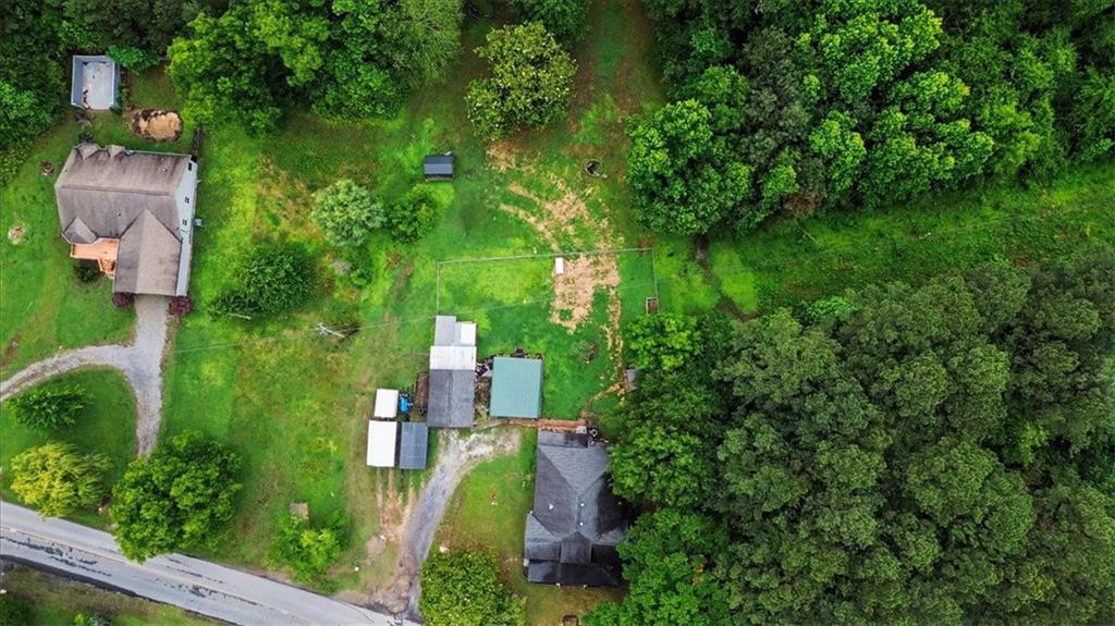 483 Coal Road Northwest Resaca, GA 30735 - Photo 53 of 56 an aerial view of a house with pool outdoor seating and yard