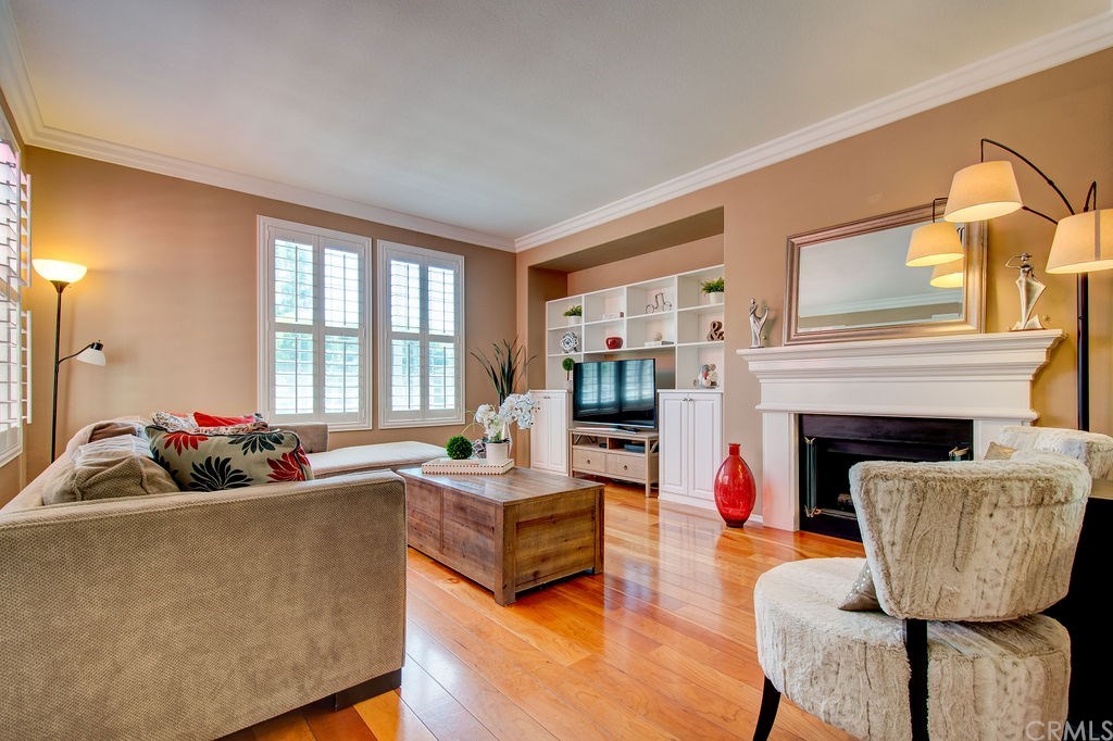 61 Autumn Irvine, CA 92602 - Photo 5 of 35 Cozy family room with fireplace