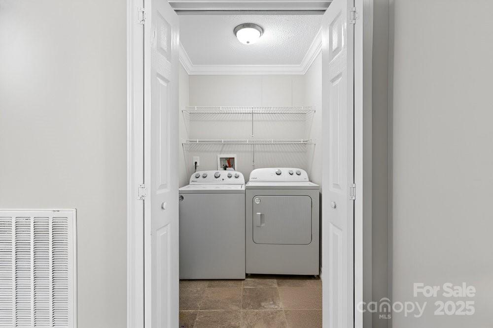 402 Shiloh Road Statesville, NC 28677 - Photo 18 of 34 a utility room with dryer and washer