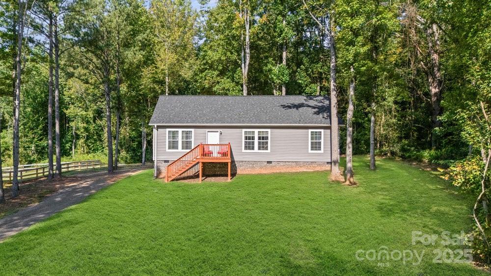 402 Shiloh Road Statesville, NC 28677 - Photo 2 of 34 a view of a house with a yard and sitting area