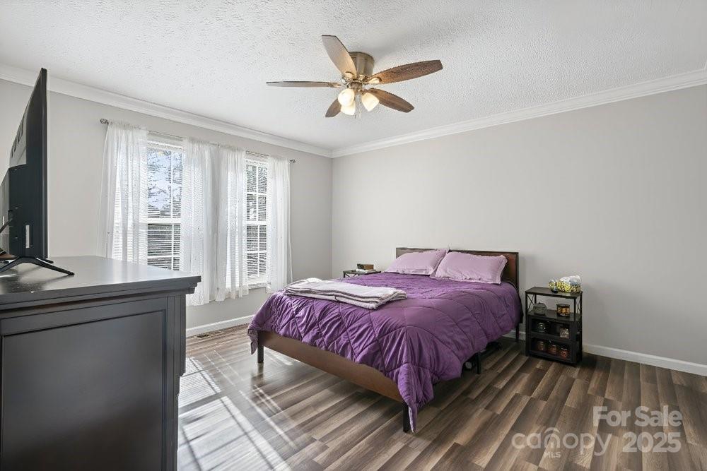402 Shiloh Road Statesville, NC 28677 - Photo 23 of 34 a bedroom with a bed and window