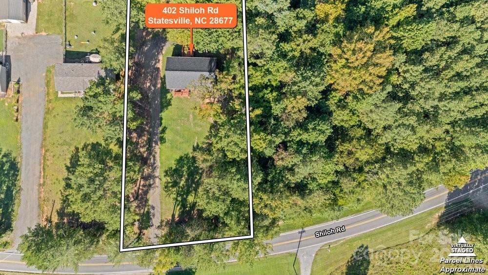 402 Shiloh Road Statesville, NC 28677 - Photo 28 of 34 a view of a backyard