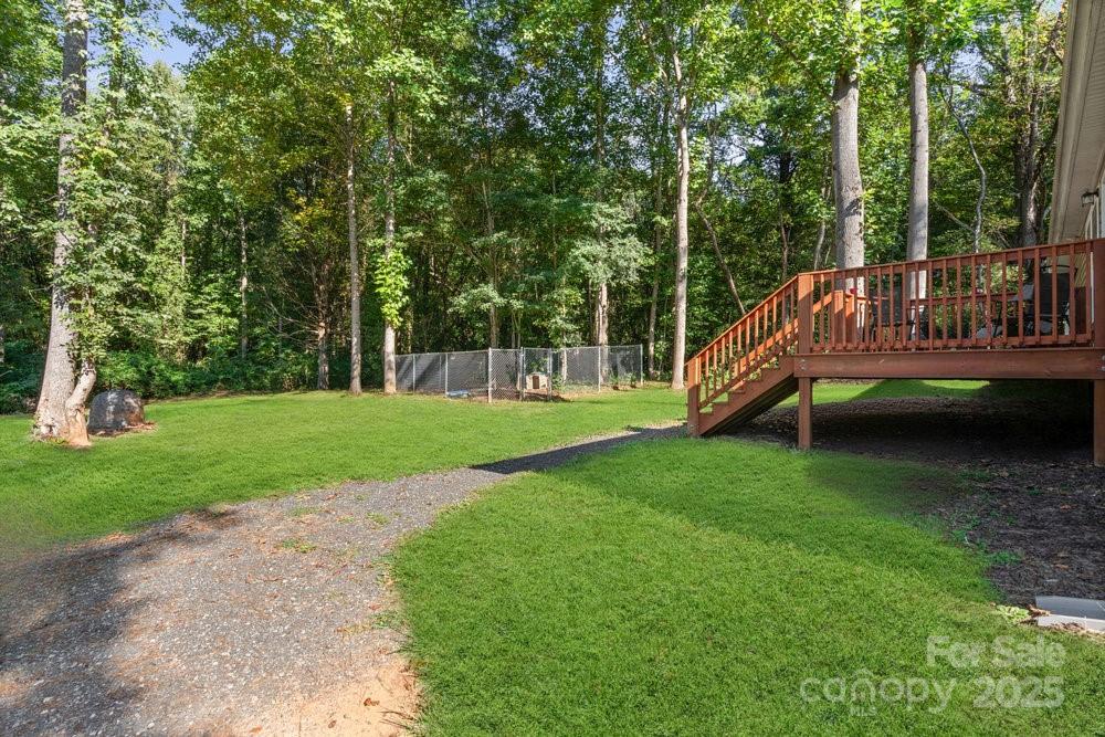 402 Shiloh Road Statesville, NC 28677 - Photo 29 of 34 a view of a house with backyard and sitting area