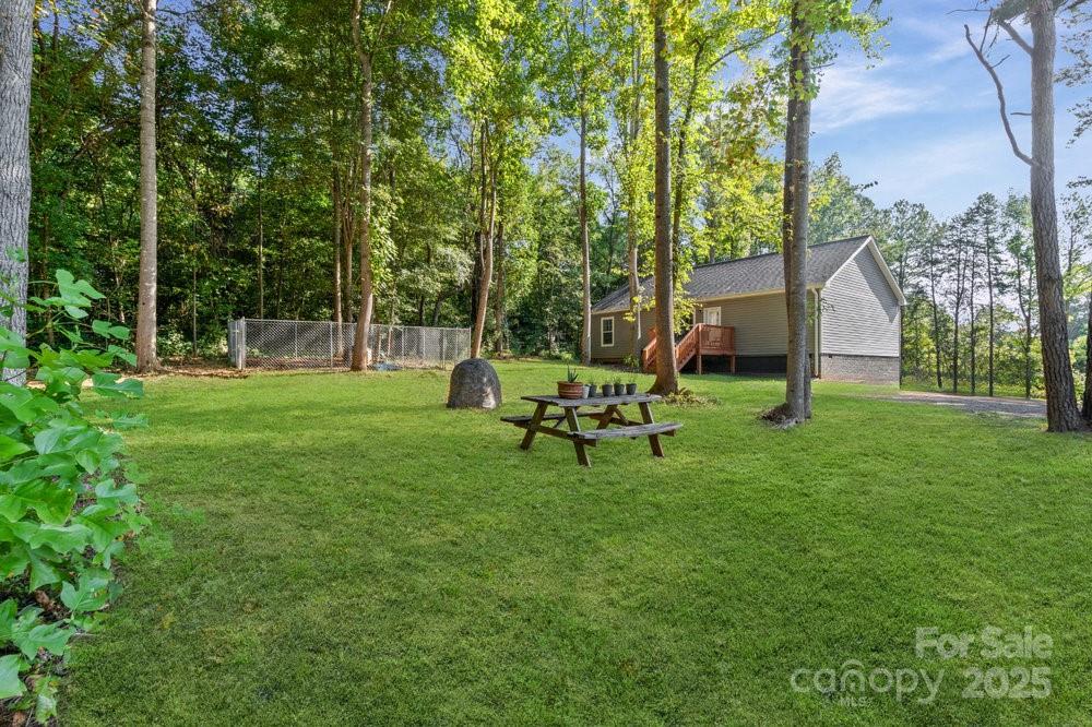 402 Shiloh Road Statesville, NC 28677 - Photo 32 of 34 a view of a park with bench and trees