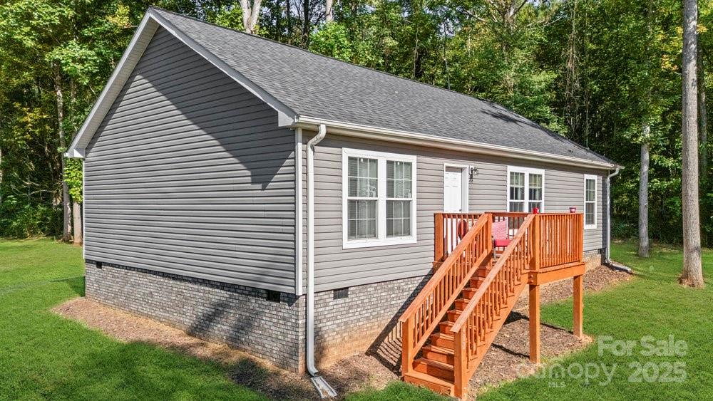 402 Shiloh Road Statesville, NC 28677 - Photo 5 of 34 a view of a house with backyard