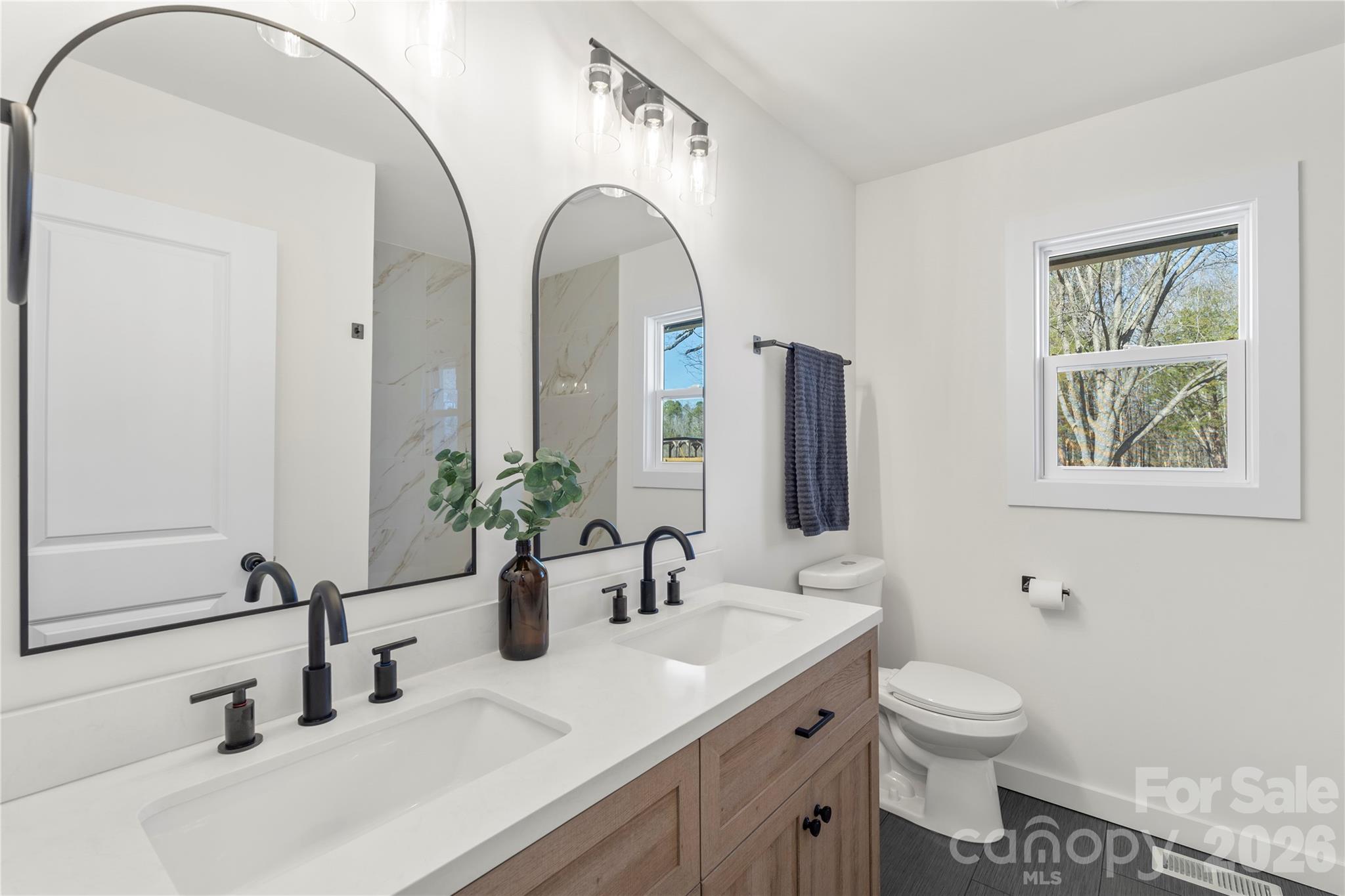 3991 State Rd S-29-330 Lancaster, SC 29720 - Photo 17 of 25 a bathroom with 2 sink and a mirror