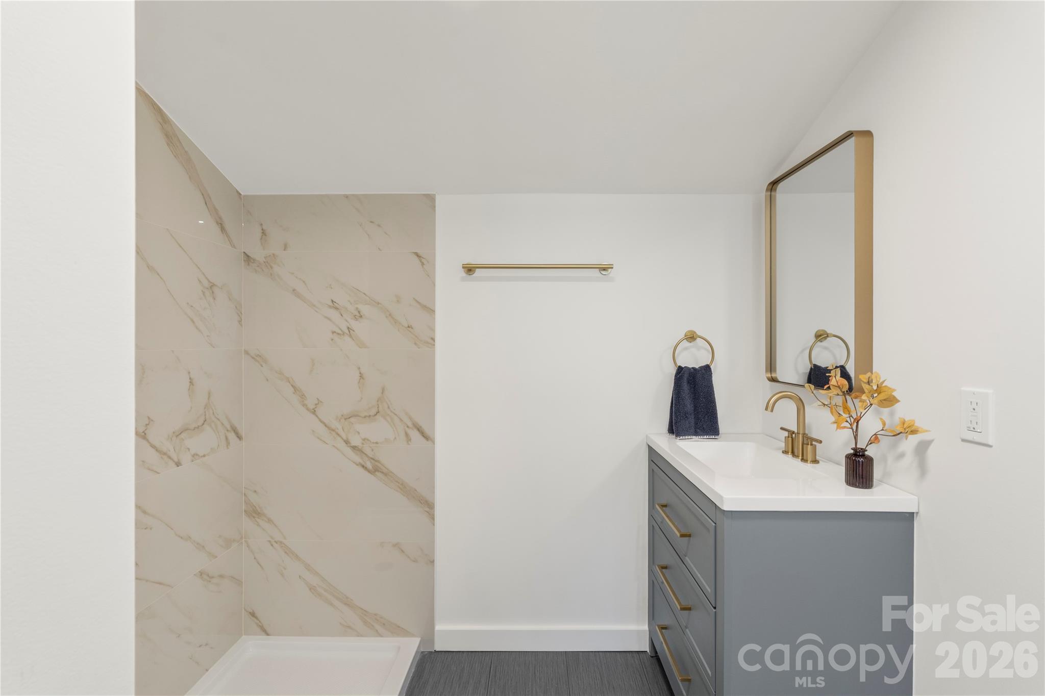 3991 State Rd S-29-330 Lancaster, SC 29720 - Photo 10 of 25 a bathroom with a sink a mirror and shower