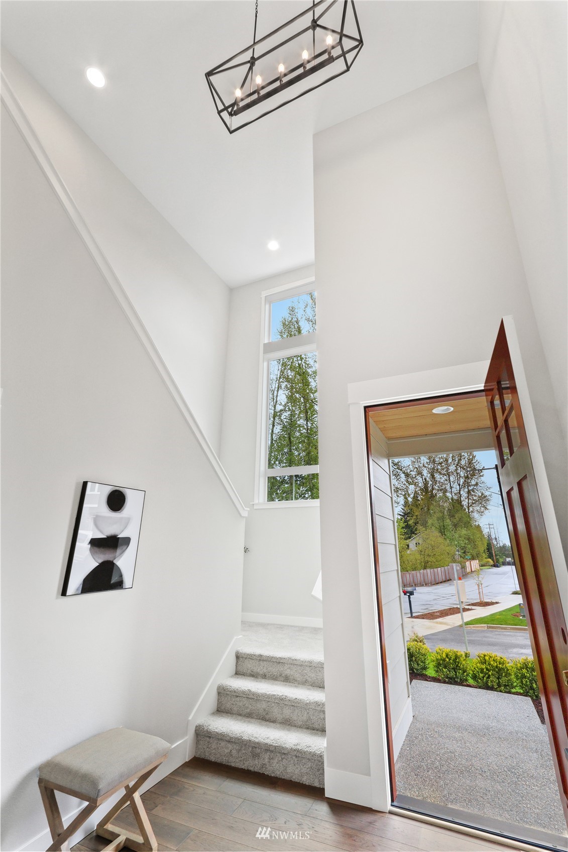1305 197th Place Southeast Bothell, WA 98012 - Photo 16 of 33 a view of entryway with wooden floor and front door