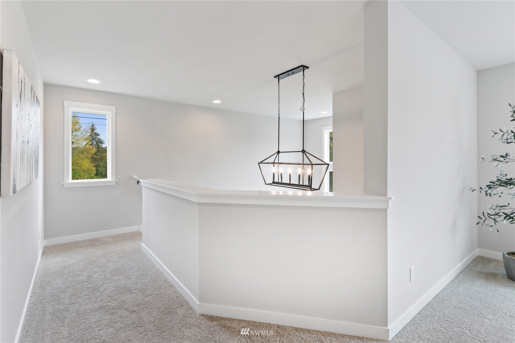 1305 197th Place Southeast Bothell, WA 98012 - Photo 17 of 33 a view of room with window and wooden floor