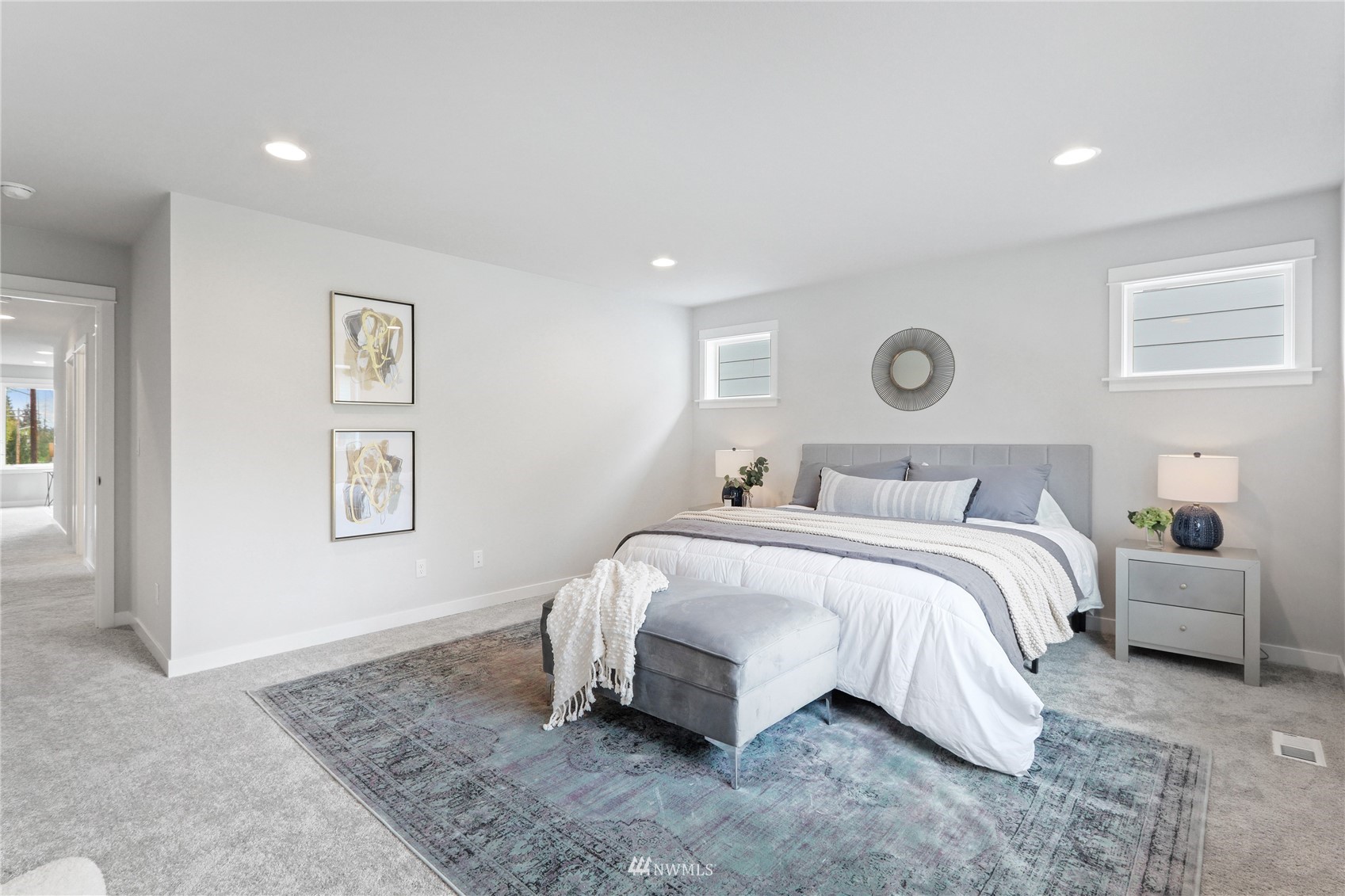 1305 197th Place Southeast Bothell, WA 98012 - Photo 20 of 33 a bedroom with a bed and painting on the wall