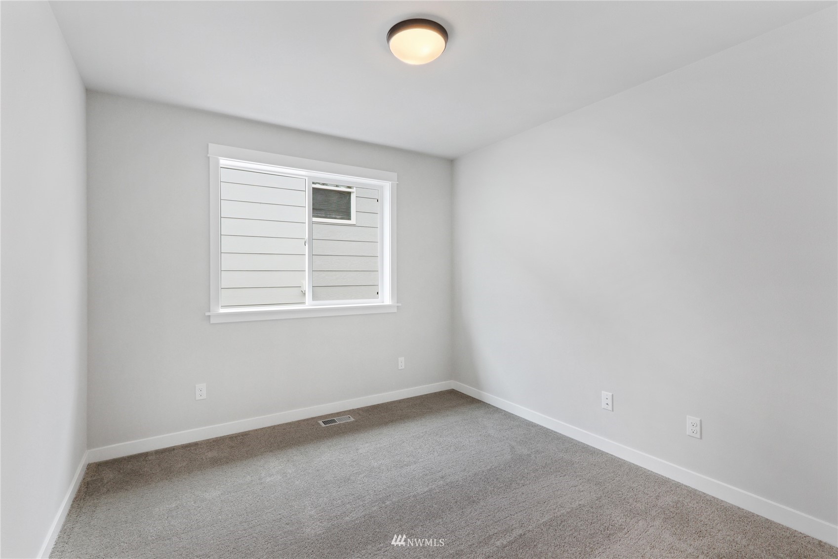 1305 197th Place Southeast Bothell, WA 98012 - Photo 26 of 33 an empty room with a window