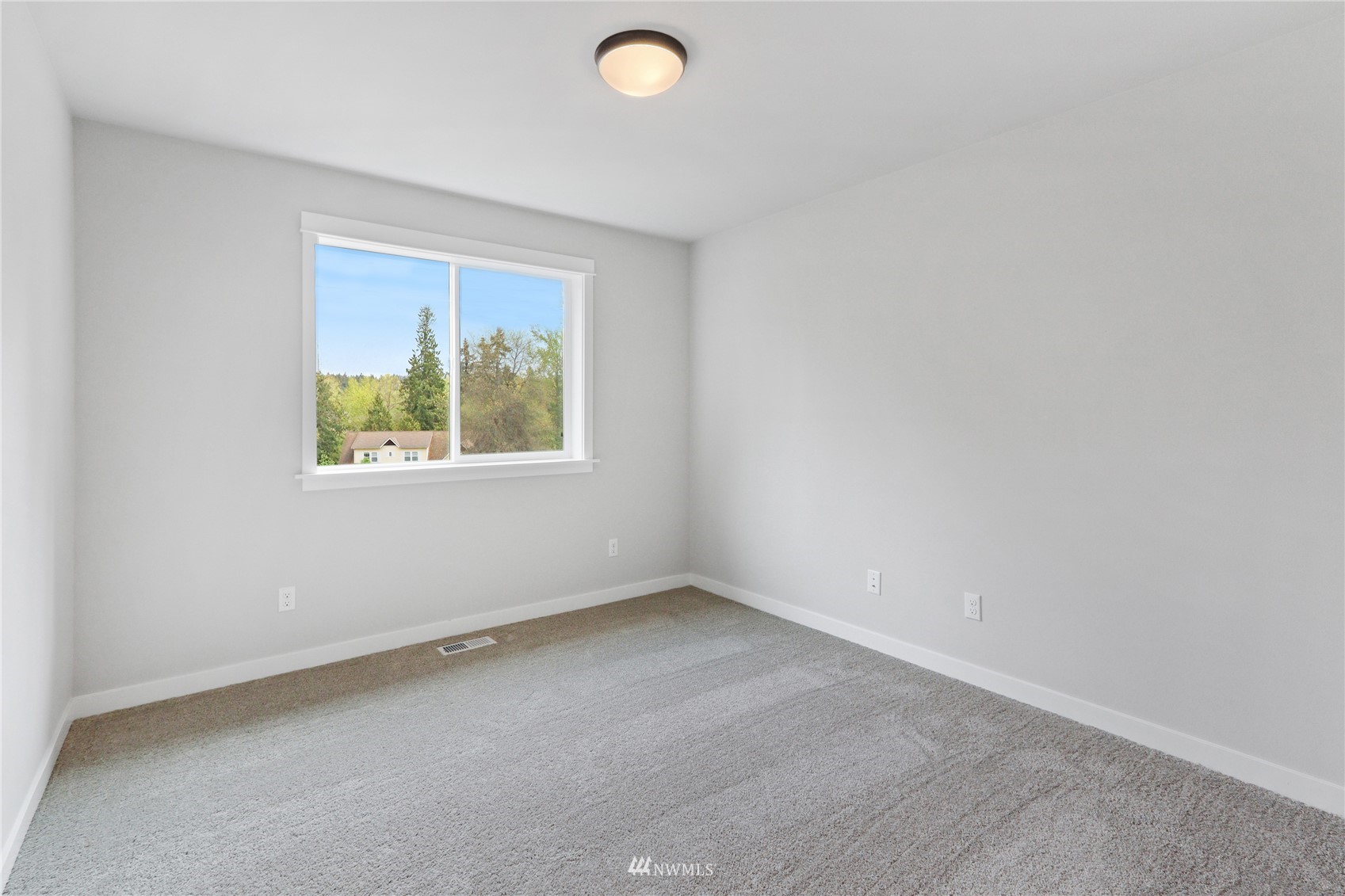 1305 197th Place Southeast Bothell, WA 98012 - Photo 28 of 33 an empty room with windows