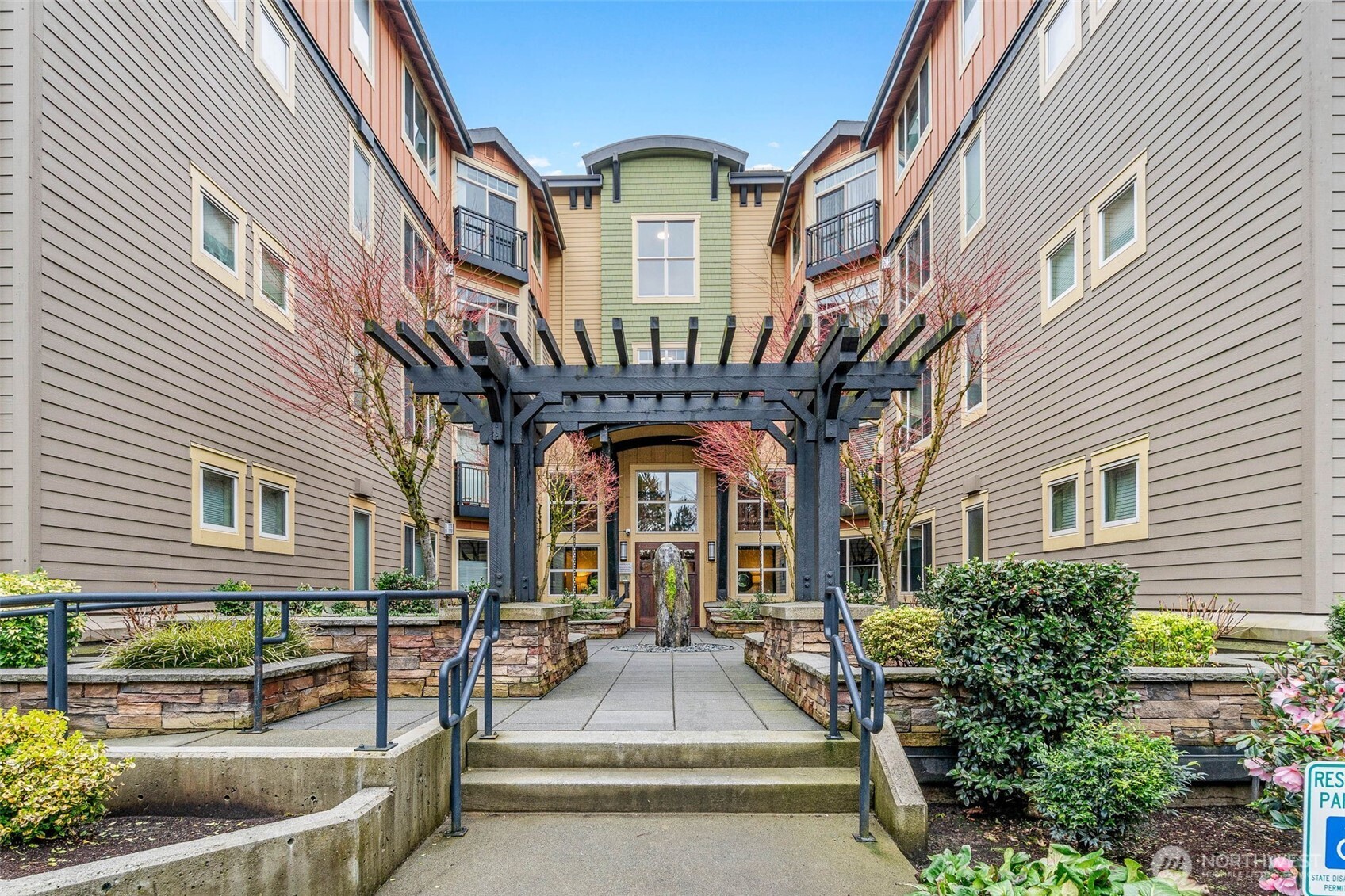 15700 116th Avenue Northeast, Unit 102A Bothell, WA 98011 - Photo 34 of 35 a view of a building with a balcony
