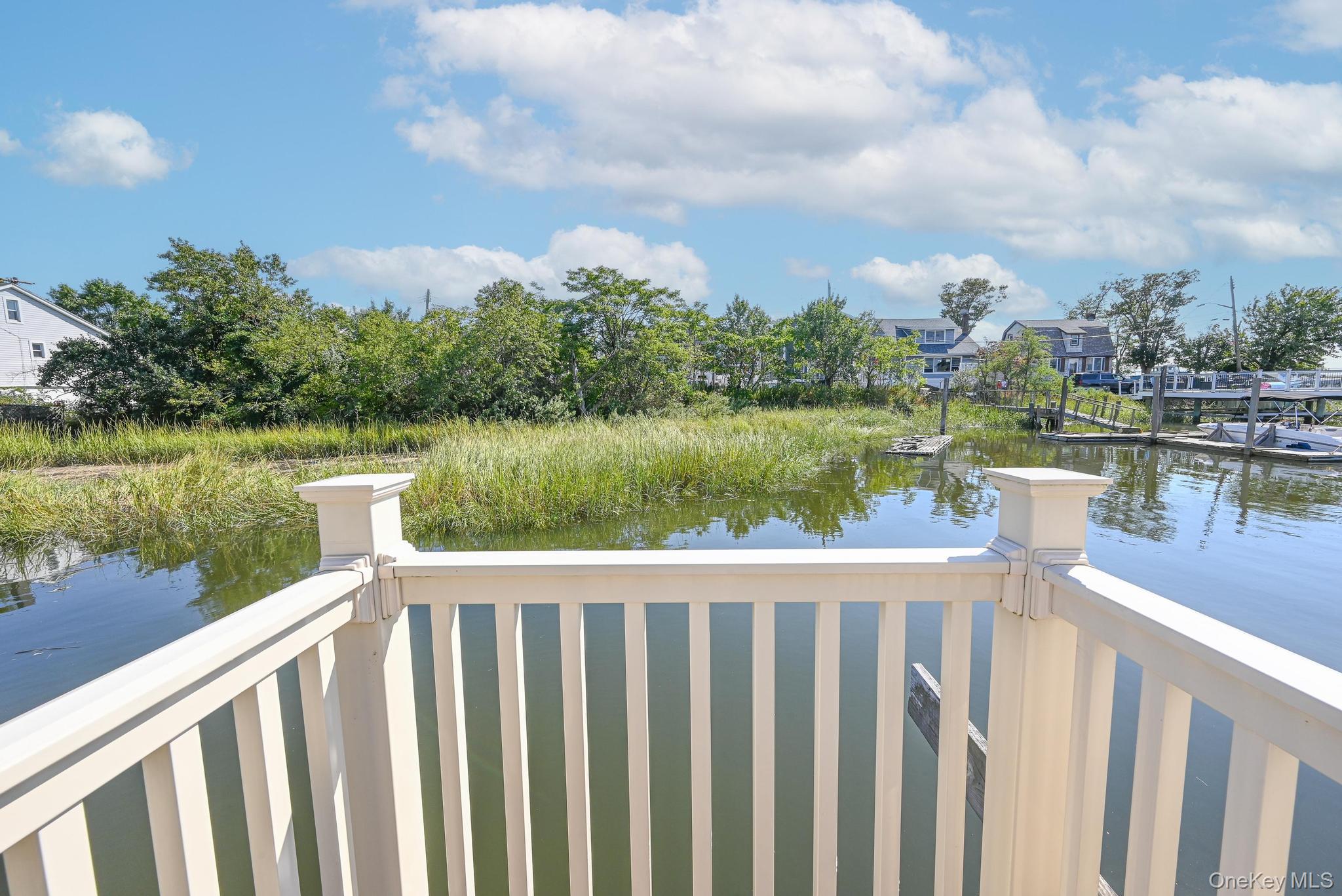 20 West 18th Road Queens, NY 11693 - Photo 12 of 41 a balcony with lake view