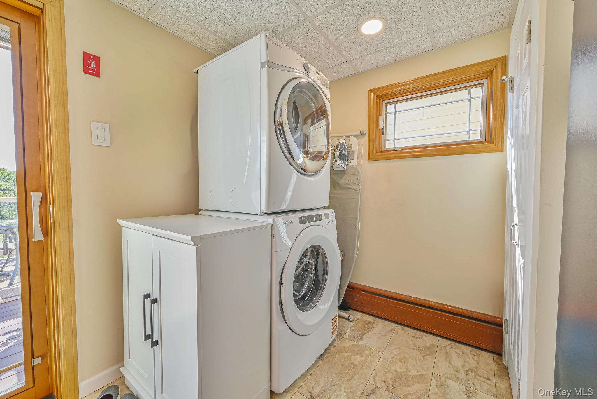 20 West 18th Road Queens, NY 11693 - Photo 28 of 41 a utility room with dryer and washer