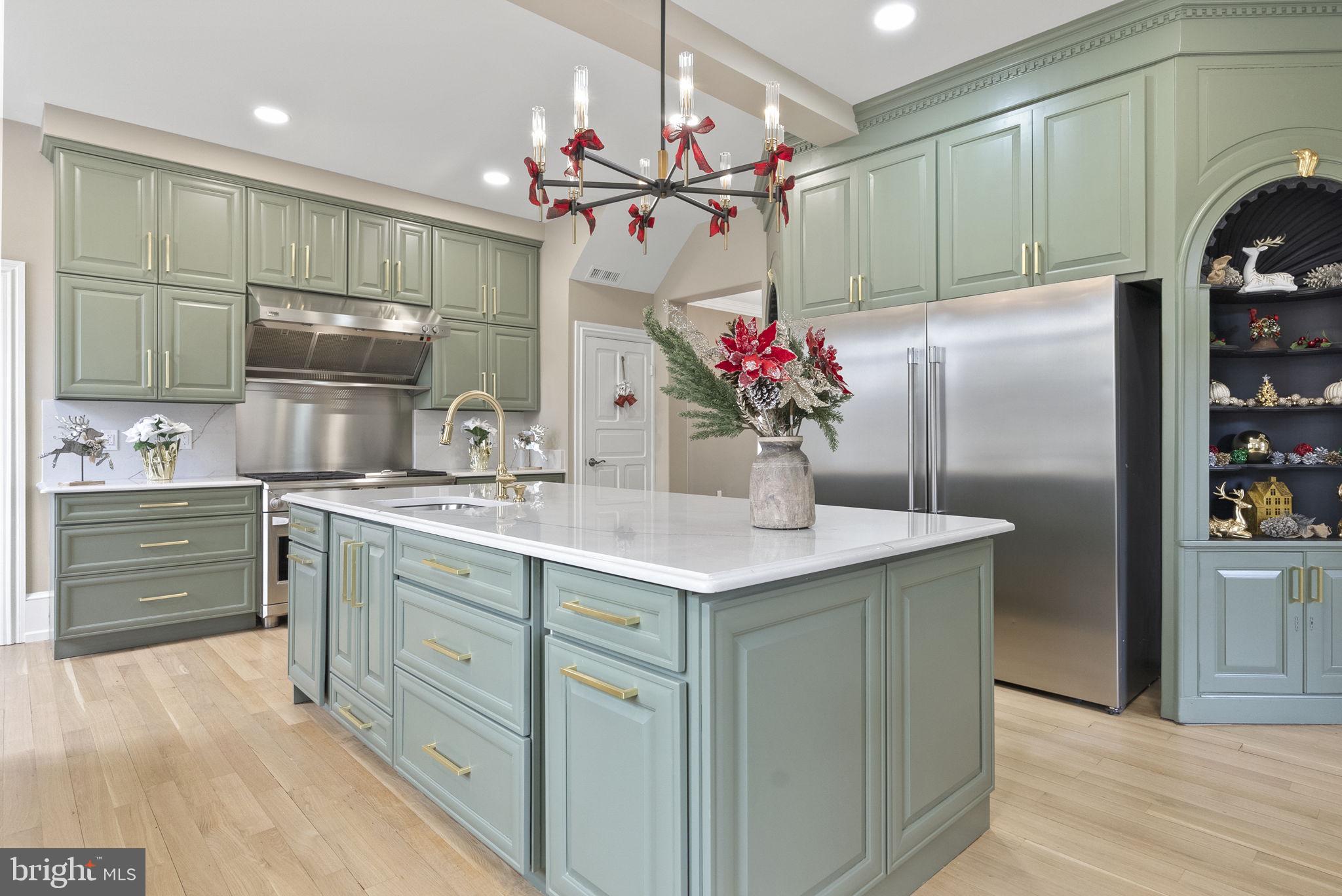 231 Woodlane Road Edgewater Park, NJ 08010 - Photo 13 of 95 a kitchen with kitchen island granite countertop stainless steel appliances and cabinets