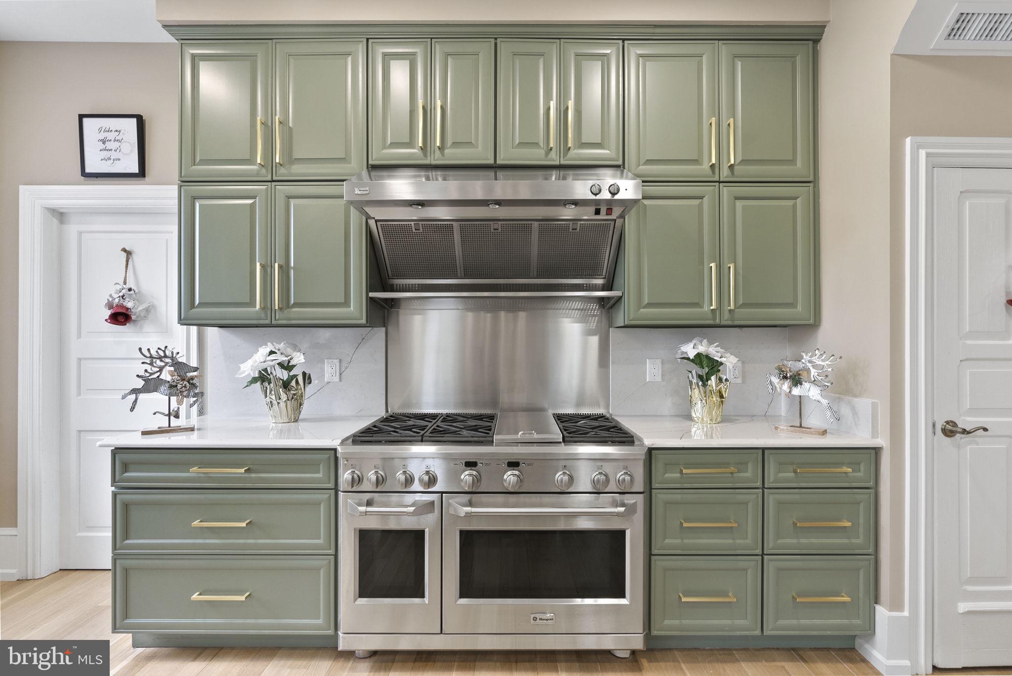 231 Woodlane Road Edgewater Park, NJ 08010 - Photo 20 of 95 a kitchen with granite countertop a stove and a microwave