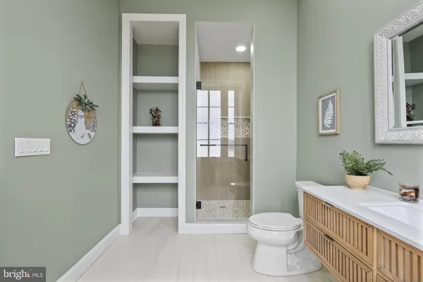 a white bath tub sitting next to a window